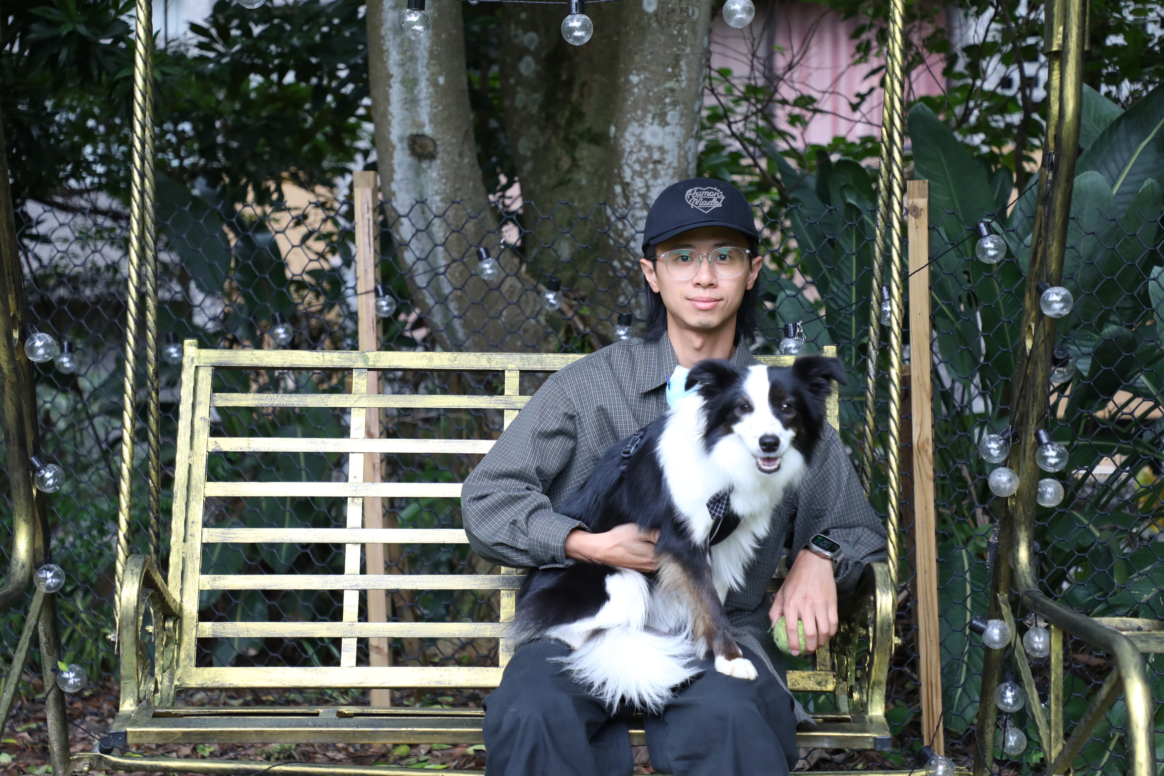 負責人詹育宏Mike與2歲的邊境牧羊犬宮梅春佳。