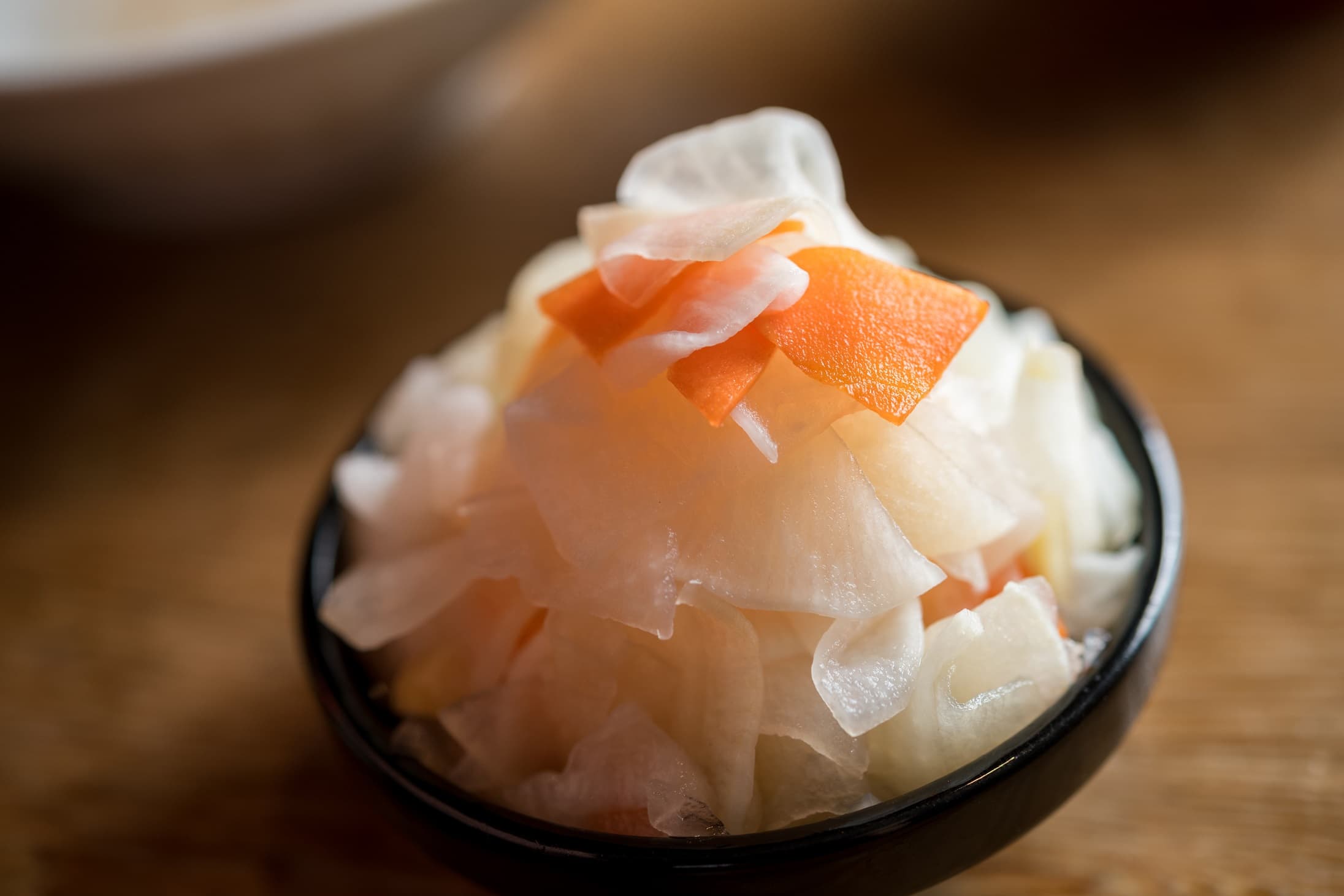 受好評的自製配菜蘿蔔泡菜也可單點。（20元／份）