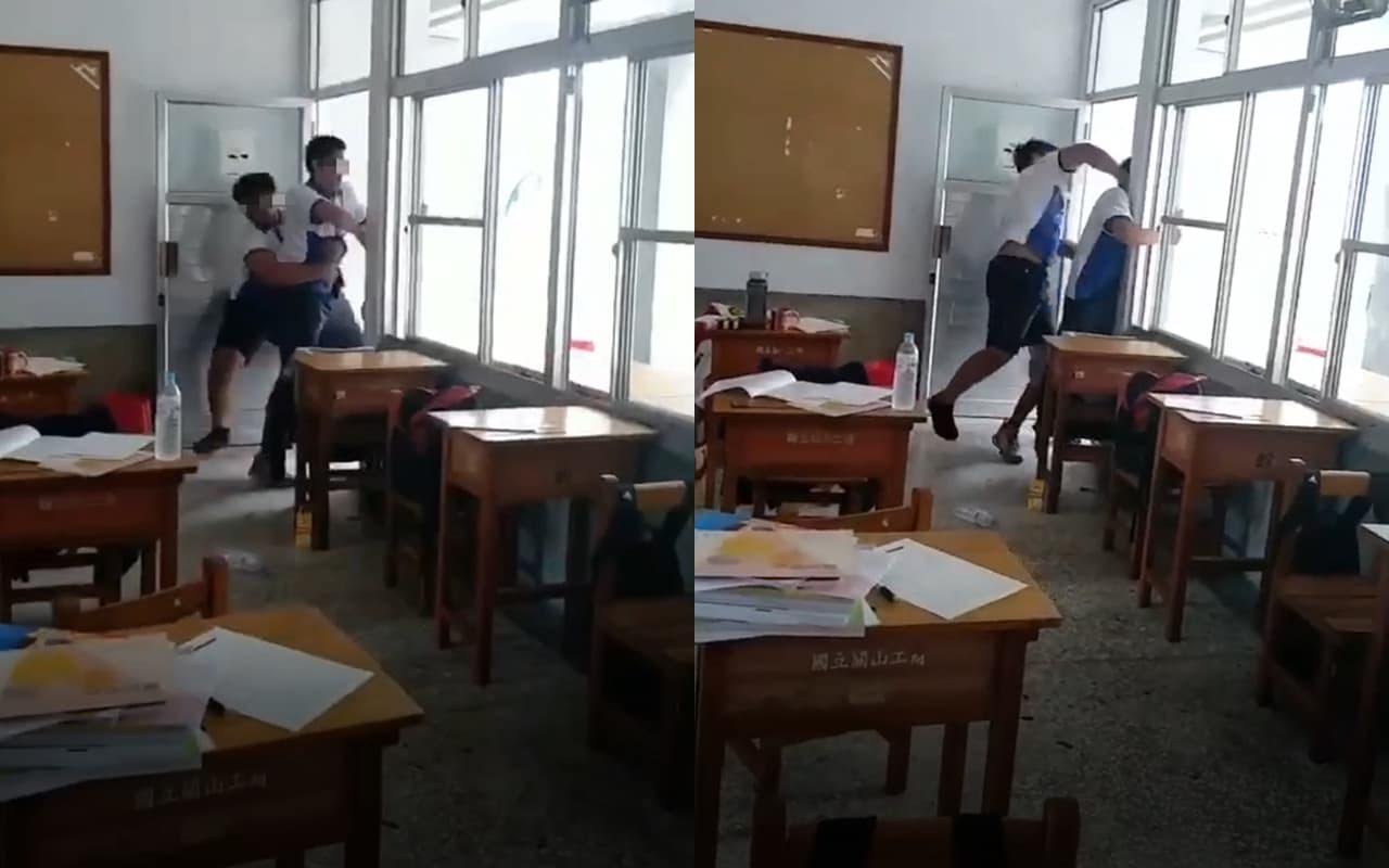 游姓同學被身材壯碩的男同學強拉回教室，還被該同學以拳頭暴打頭部。（翻攝畫面）