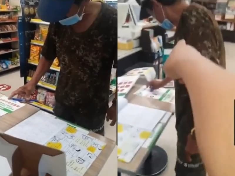 路人男不斷在迷彩男在補登實聯制資料時，逼對方「鞠躬道歉」否則要報警。（翻攝自「爆怨2公社」）
