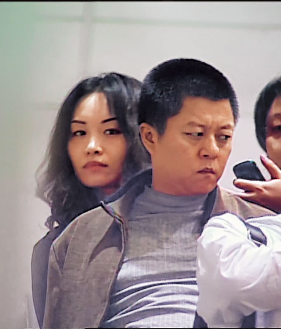 唐瑛（左）與張男（右）在中國被逮，並遭押解回台受審。（東森新聞提供）