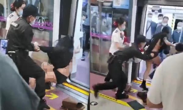女子遭保全扯到衣不蔽體，疑似連內衣都被扯掉。（翻攝自畫面）