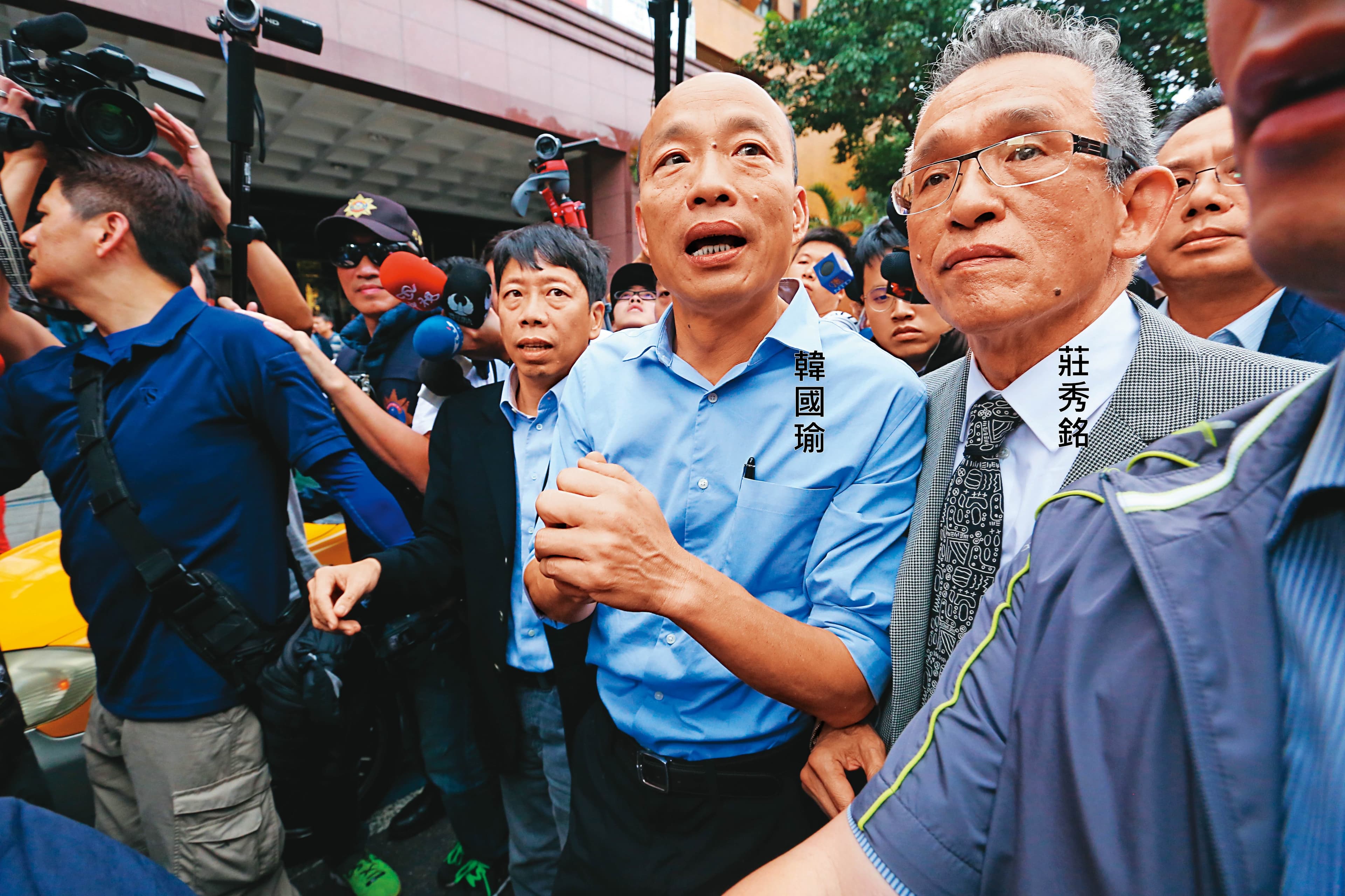 莊秀銘律師2019年5月陪同韓國瑜赴台北地檢署提告。