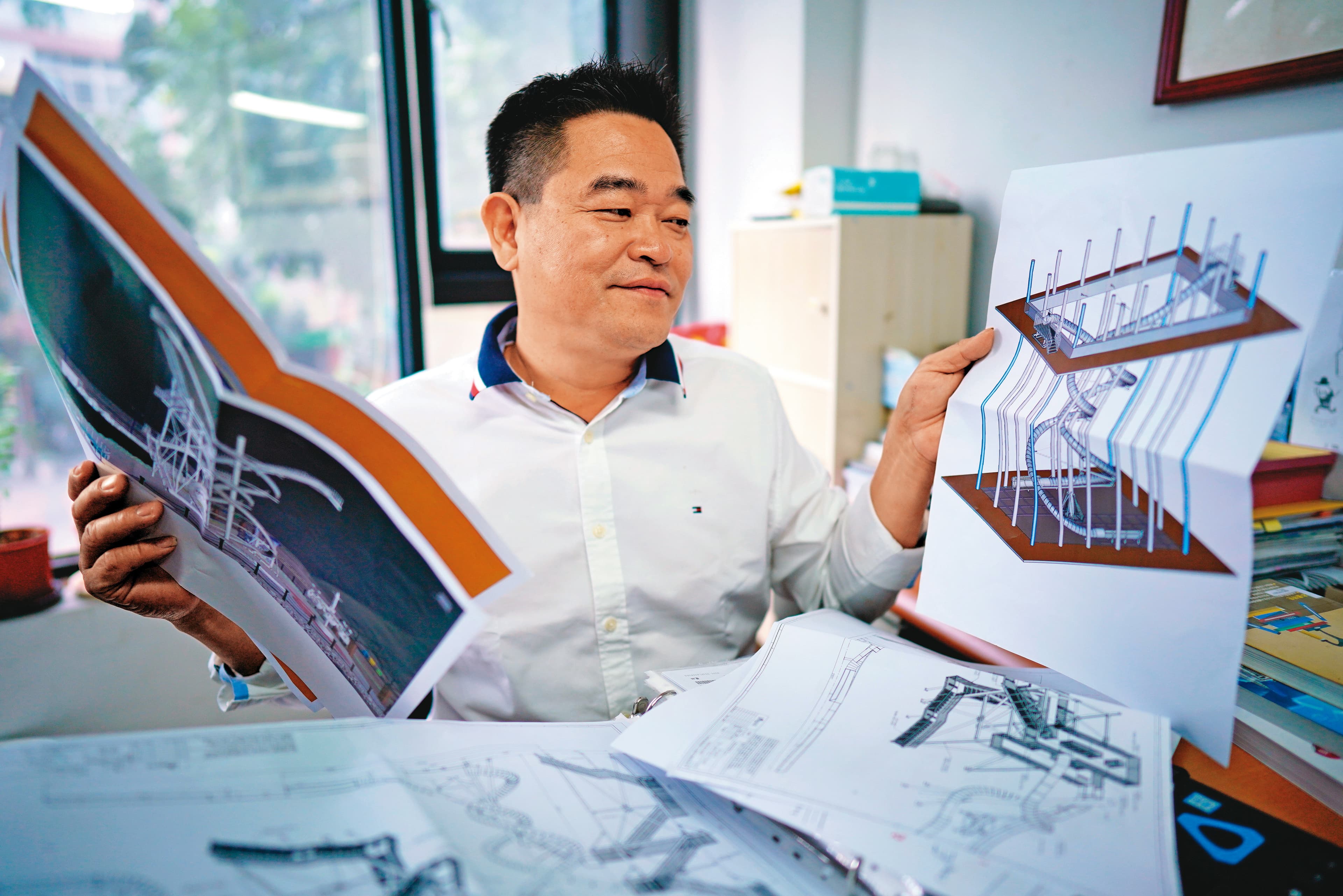 吳思漢擊敗亞洲近百家上市公司，獨家取得德國Wiegand立體螺旋溜滑梯代理權。