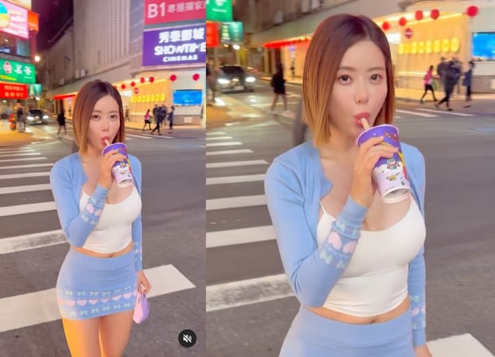 DJ SODA不畏寒流，穿低胸小可愛、超短裙現身台北街頭，滿足大口吸珍珠奶茶嚐鮮。（翻攝IG @deejaysoda）