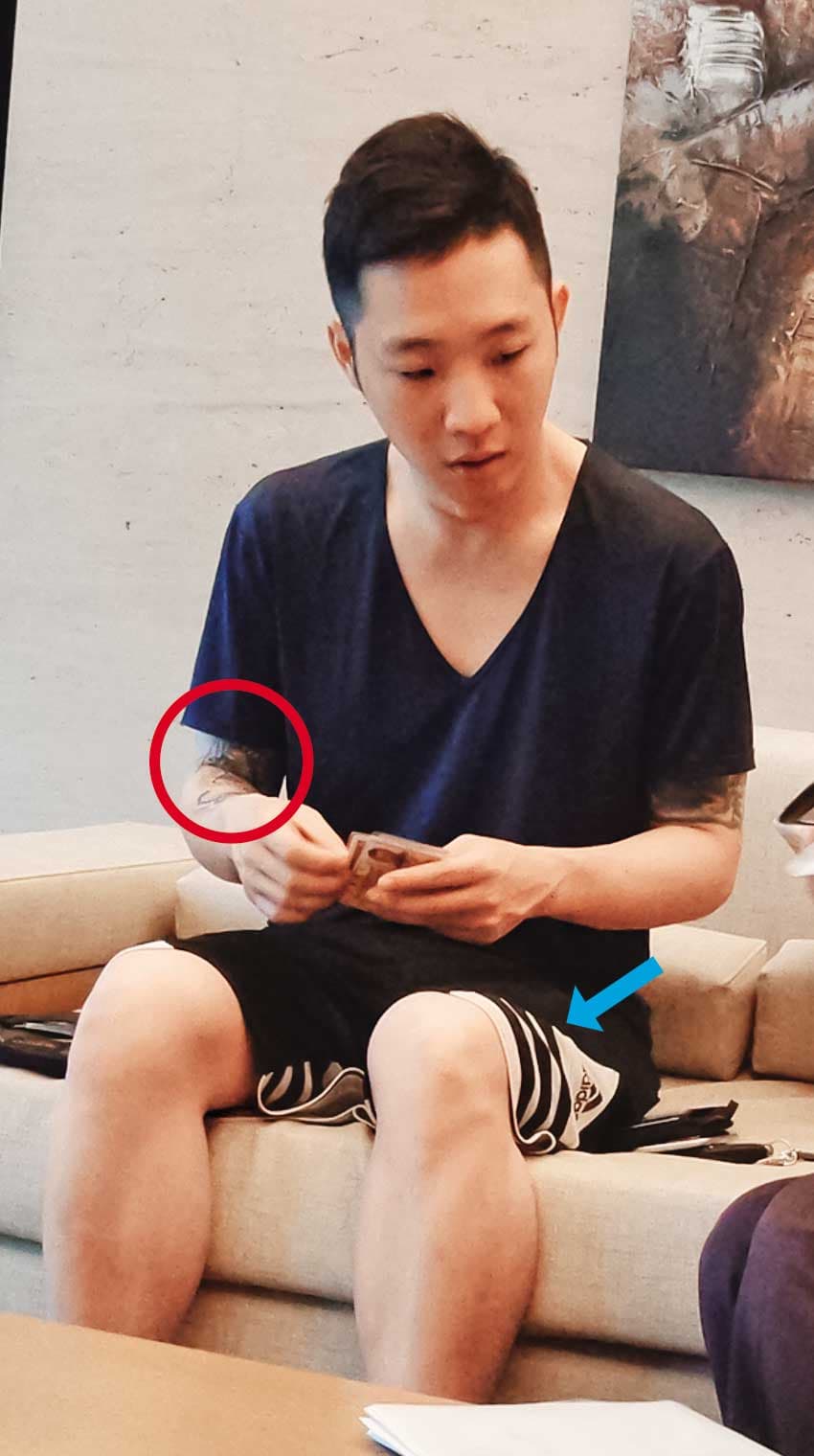 劉男時常穿著1件黑色條紋短褲，手上紋有特殊的刺青（紅圈處）。（當事人提供）