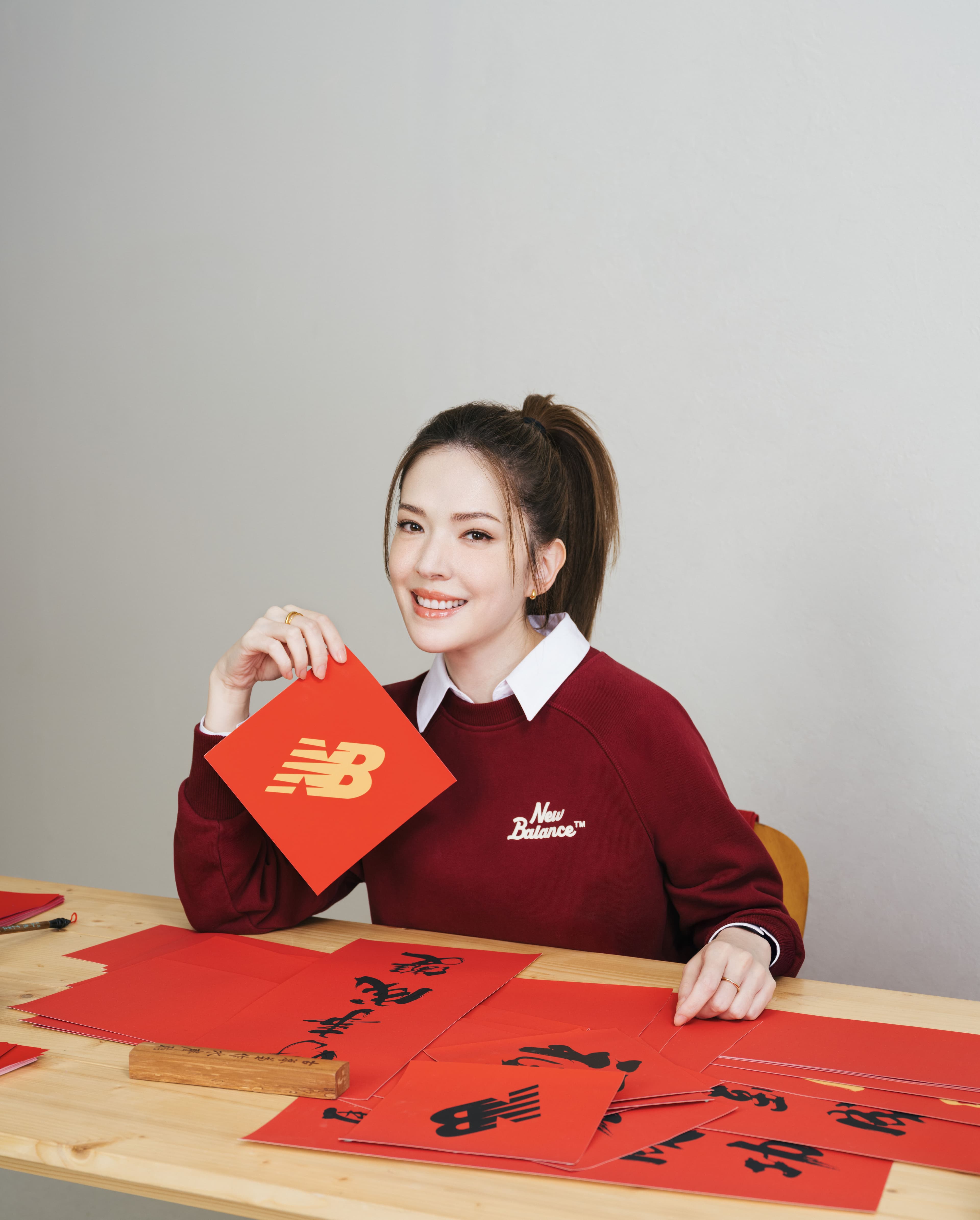 許瑋甯今天多了老闆身分。（New Balance）