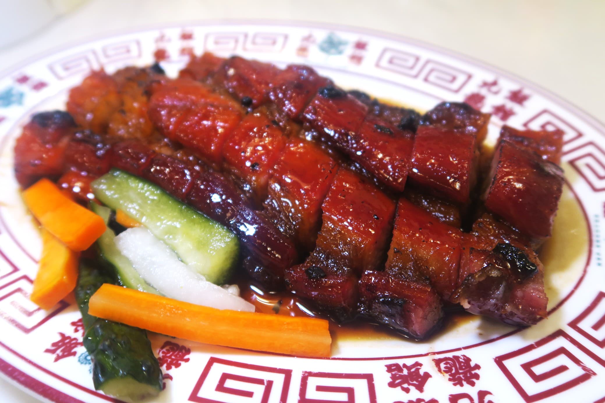 精選梅頭肉製作的叉燒，肥瘦比例恰到好處。（港幣118元／5塊，約NT$478）